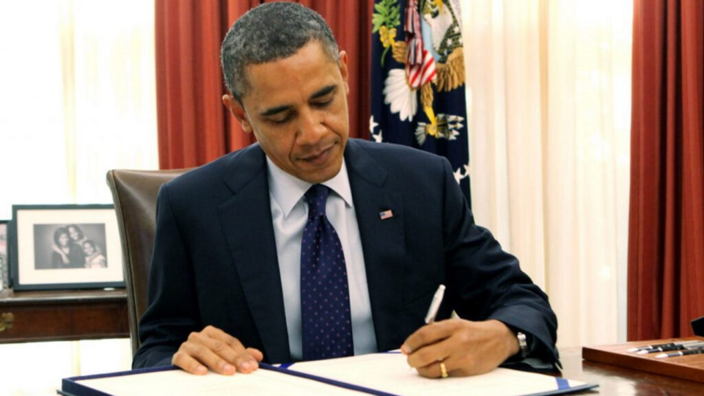 Obama_signing_bill